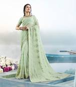 Light green embroidered faux georgette saree with blouse
