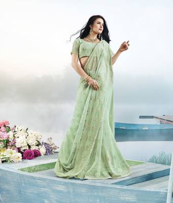 Light green embroidered faux georgette saree with blouse 2