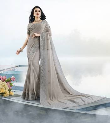 Grey embroidered faux georgette saree with blouse 1