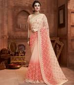 Cream embroidered net saree with blouse