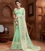 Light green embroidered net saree with blouse