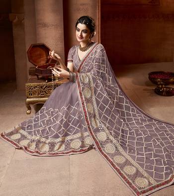 Grey embroidered net saree with blouse 2