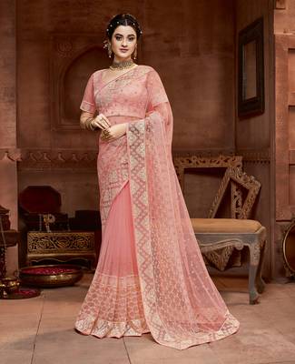 Peach embroidered net saree with blouse 1