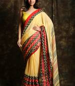 Light yellow woven organza saree with blouse