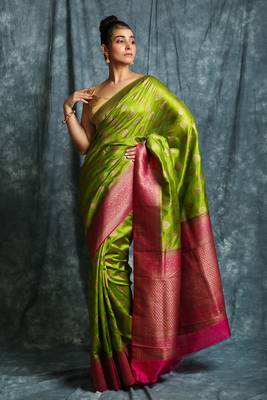 Green woven silk saree with blouse 1