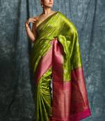 Green woven silk saree with blouse