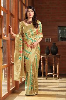 Cream woven banarasi saree with blouse
