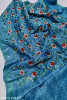 Handwoven silk linen saree with floral embroidery work