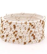 Beige bangles-and-bracelets