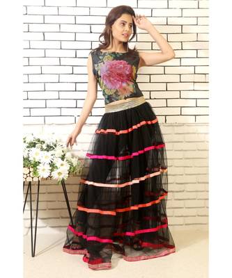 black net skirt with pink handmade silk ribbons and printed blouse with black slacks 1