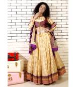 gold  checked lehenga with purple banarasi border and 2 piece brocade blouse and purple banarsi dupatta and cancan