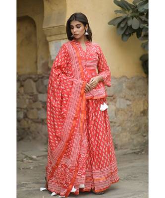 lehenga styled with pure hand block printed paplum top and dupatta with tassels 1
