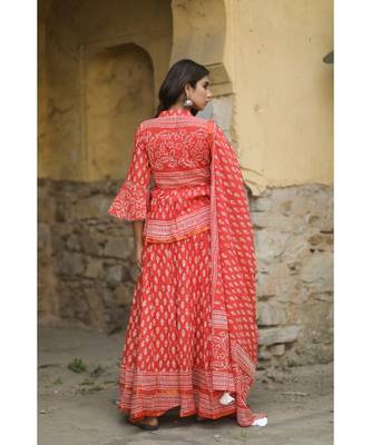 lehenga styled with pure hand block printed paplum top and dupatta with tassels 2