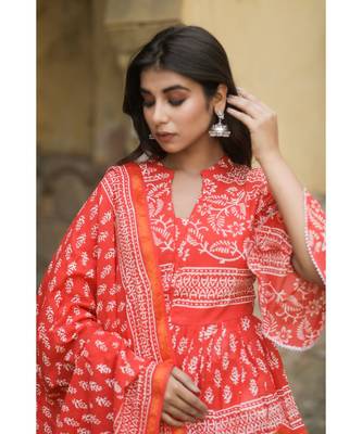 lehenga styled with pure hand block printed paplum top and dupatta with tassels 3