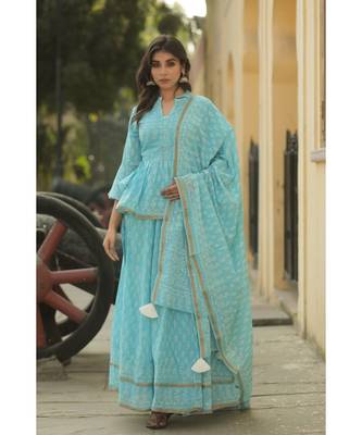 lehenga styled with pure hand block printed paplum top and dupatta with tassels 1