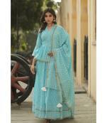 lehenga styled with pure hand block printed paplum top and dupatta with tassels