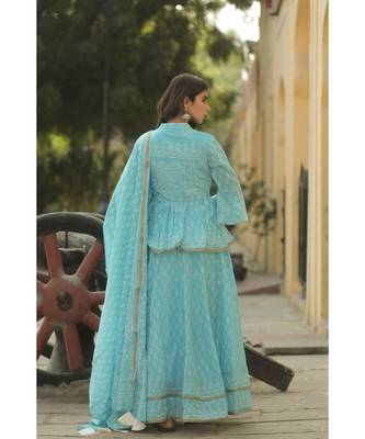 lehenga styled with pure hand block printed paplum top and dupatta with tassels 2