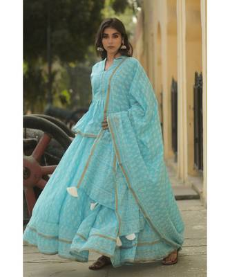 lehenga styled with pure hand block printed paplum top and dupatta with tassels 3