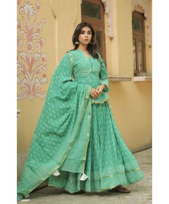 lehenga styled with pure hand block printed paplum top and dupatta with tassels 1