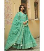 lehenga styled with pure hand block printed paplum top and dupatta with tassels