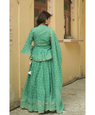 lehenga styled with pure hand block printed paplum top and dupatta with tassels 2
