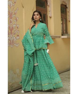 lehenga styled with pure hand block printed paplum top and dupatta with tassels 3