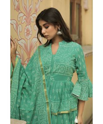 lehenga styled with pure hand block printed paplum top and dupatta with tassels 4