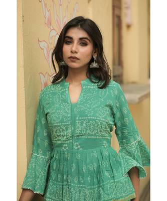 lehenga styled with pure hand block printed paplum top and dupatta with tassels 6