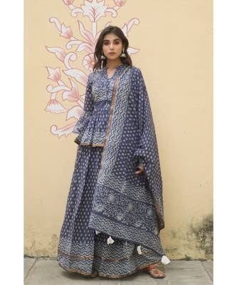 lehenga styled with pure hand block printed paplum top and dupatta with tassels 1