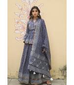 lehenga styled with pure hand block printed paplum top and dupatta with tassels