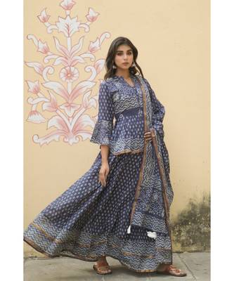 lehenga styled with pure hand block printed paplum top and dupatta with tassels 2