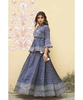 lehenga styled with pure hand block printed paplum top and dupatta with tassels 3
