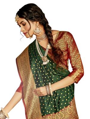Dark green woven silk saree with blouse 2