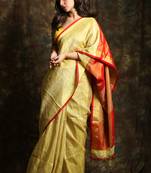 Golden woven tissue saree with blouse