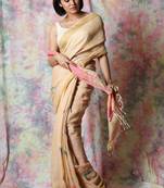 Beige woven tissue saree with blouse