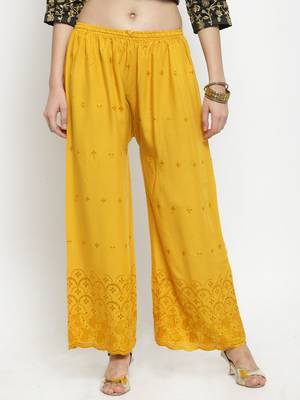 Mustard embroidered rayon palazzo-pants 1