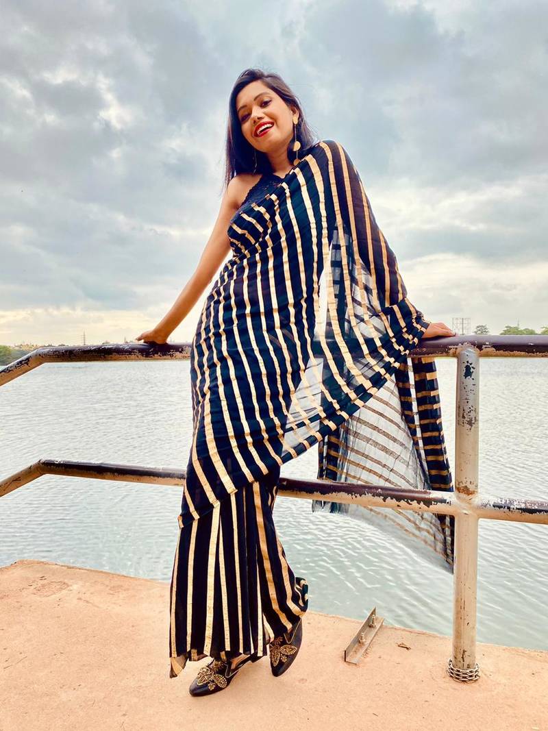 Black  Blended Georgette Saree With Golden Printed Stripes georgette_sarees