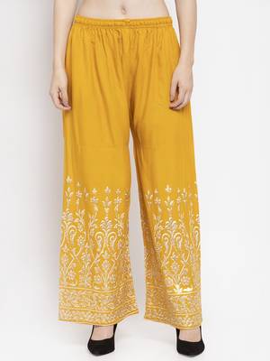 Mustard printed rayon palazzo-pants 1