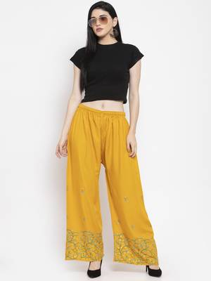 Mustard printed rayon palazzo-pants 2
