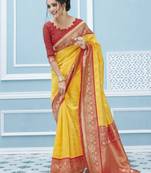 Yellow woven banarasi silk saree with blouse