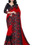 Red embroidered silk saree with blouse