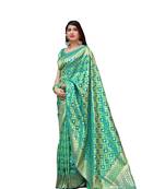 Light green woven banarasi silk saree with blouse