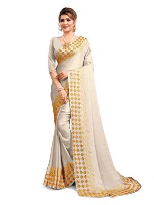 Cream embroidered satin saree with blouse 1