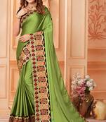 Green embroidered silk blend saree with blouse