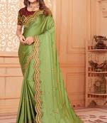 Green embroidered silk blend saree with blouse
