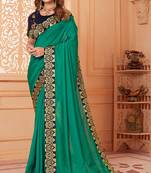Green embroidered silk blend saree with blouse