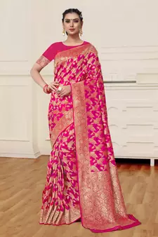 Rani pink woven banarasi silk saree with blouse