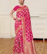 Rani pink woven banarasi silk saree with blouse