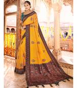 ochre yellow saree with kashmiri jacquard pallu and borders