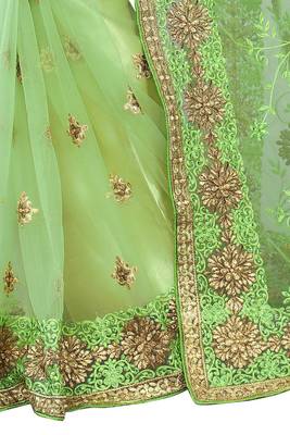 Green embroidered net saree with blouse 4